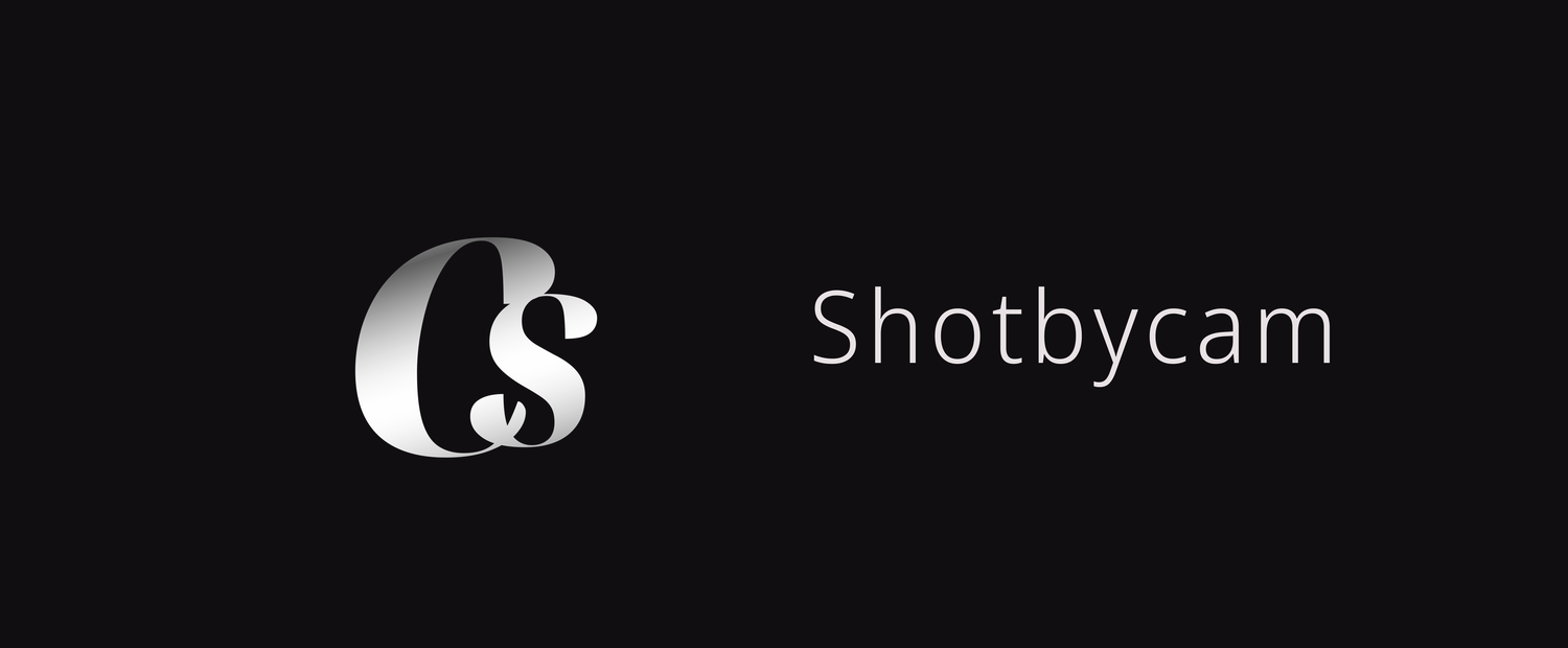 Shot by Cam logo