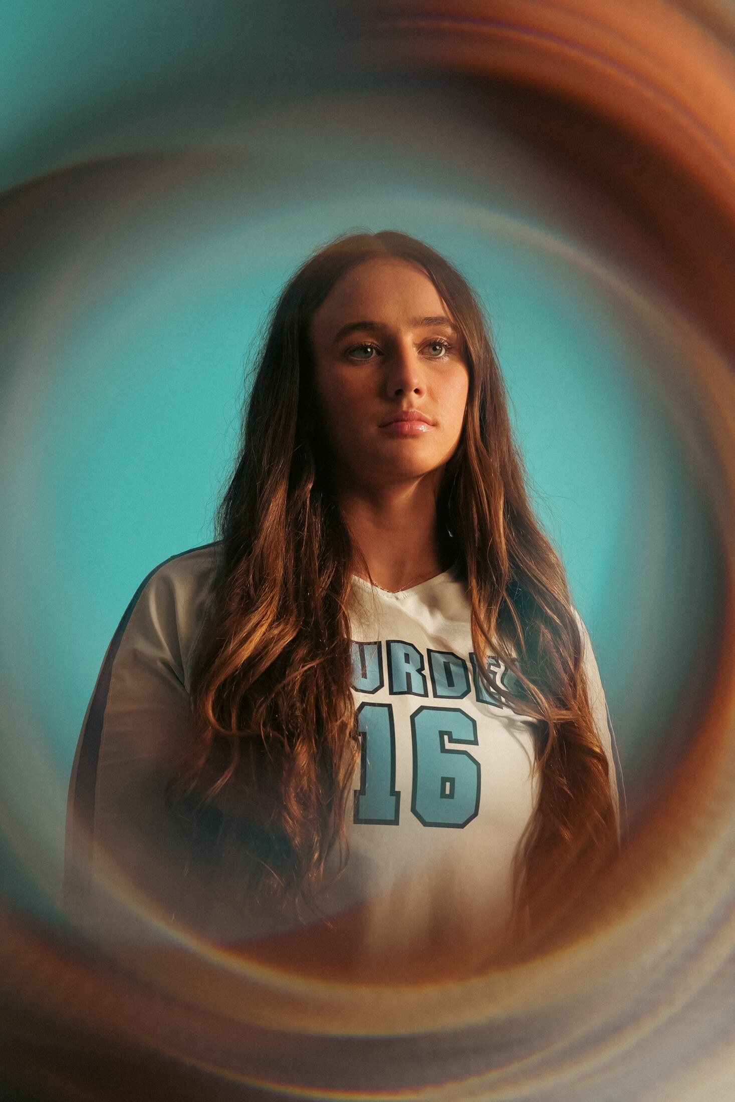 Athlete portrait inside a ring of light