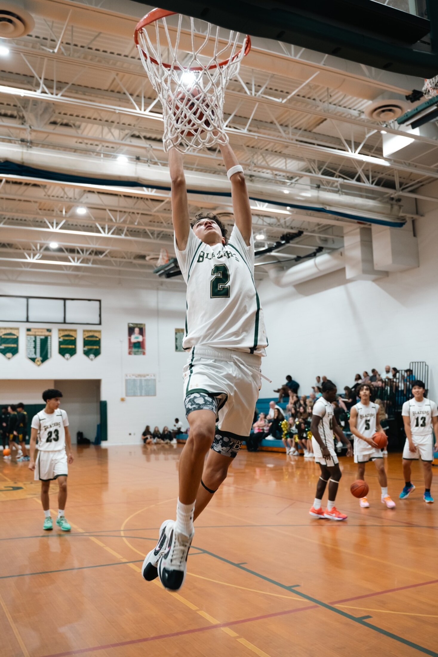 Basketball player going up for a dunk