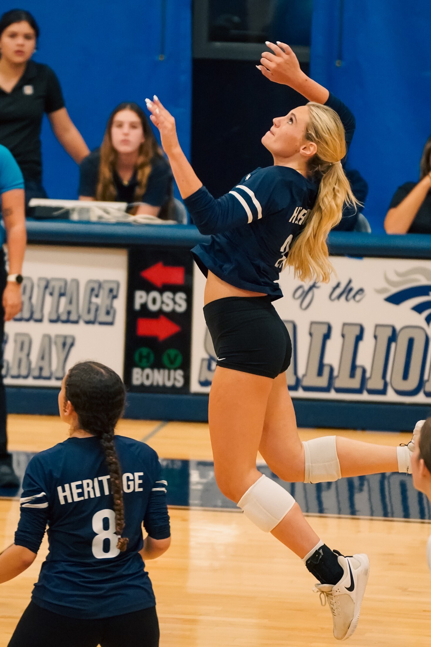 Volleyball player tossing a serve