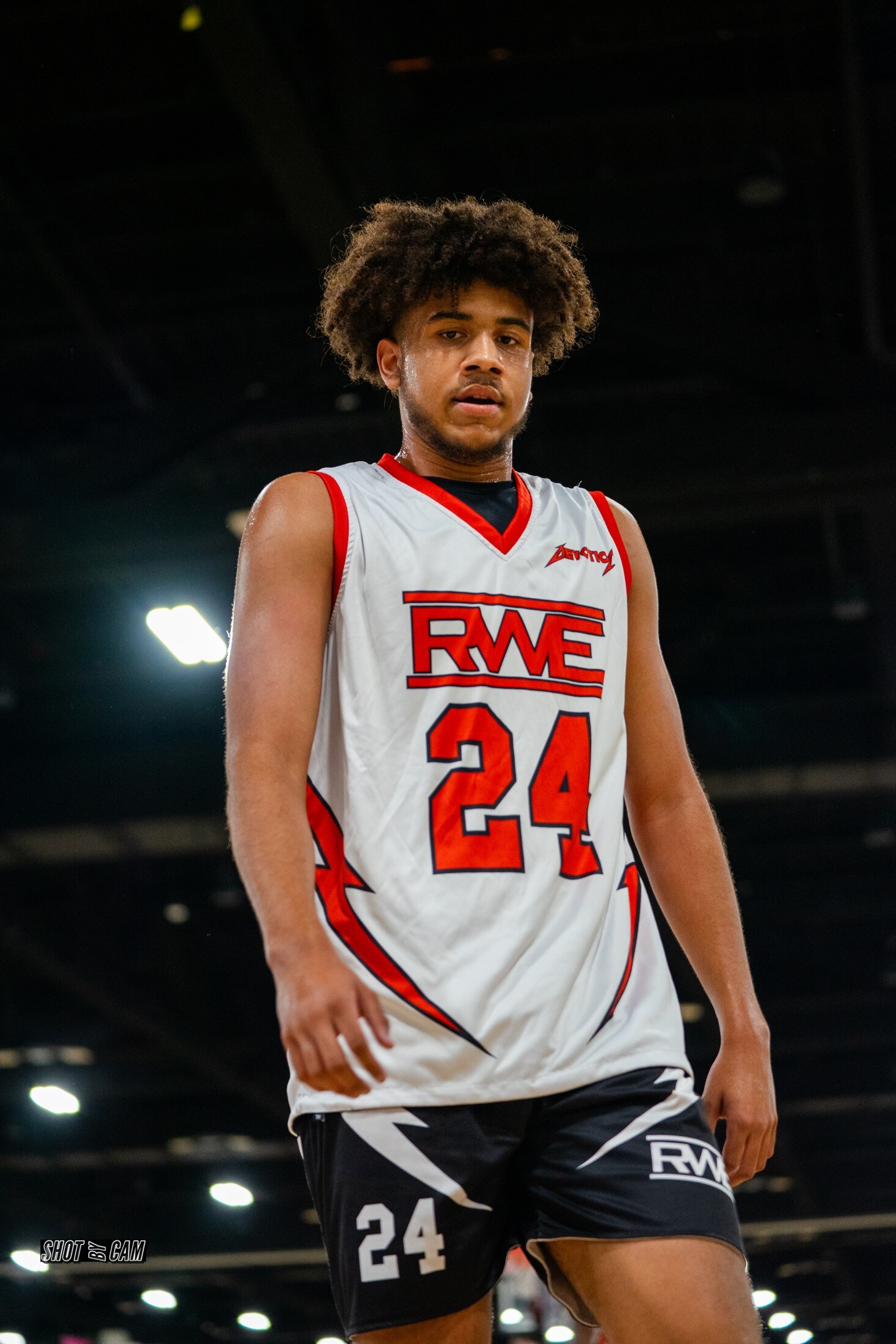 Basketball player looking over the court between plays
