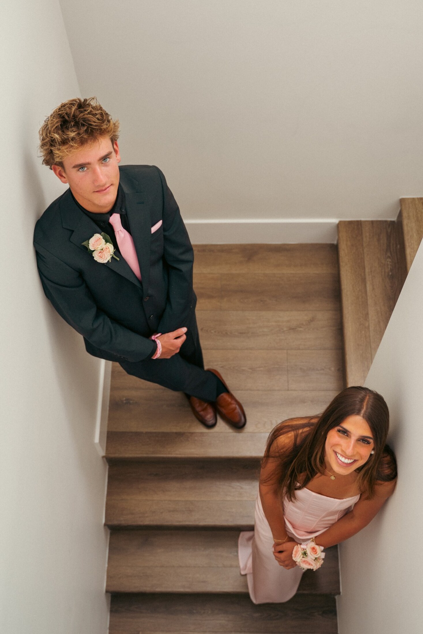 Bride and groom on the stairs